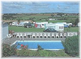 The swimming pool with roof retracted