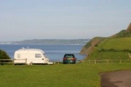 Touring with views to Thorncombe Beacon