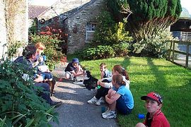 Visitors relaxing about the farm