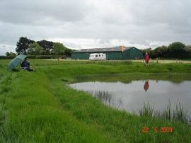 Peace fishing at pond